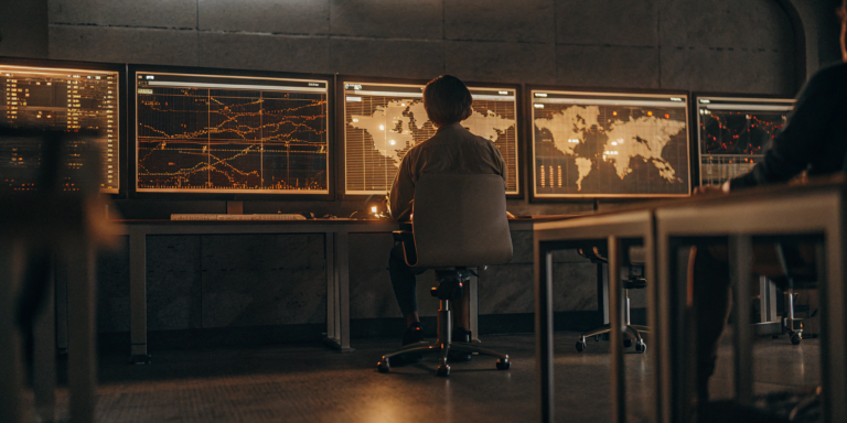 A security analyst managing threat exposure on a dedicated management platform dashboard.