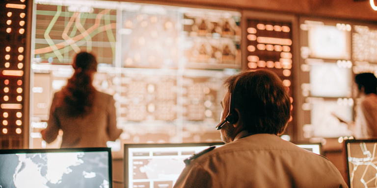 Security analysts review dashboards for continuous monitoring and threat detection.